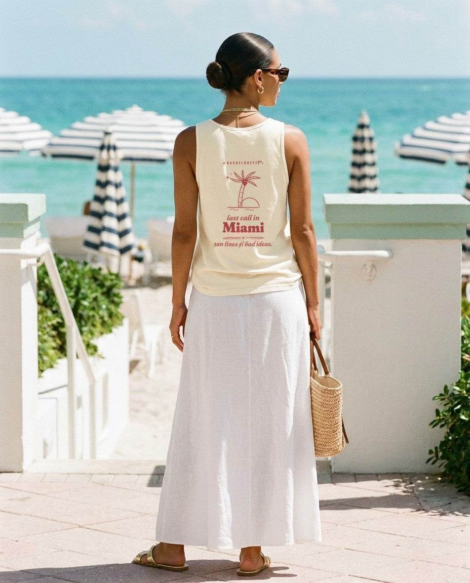 Miami Bachelorette Tank Top in Ivory with a white linen maxi skirt at a beach hotel