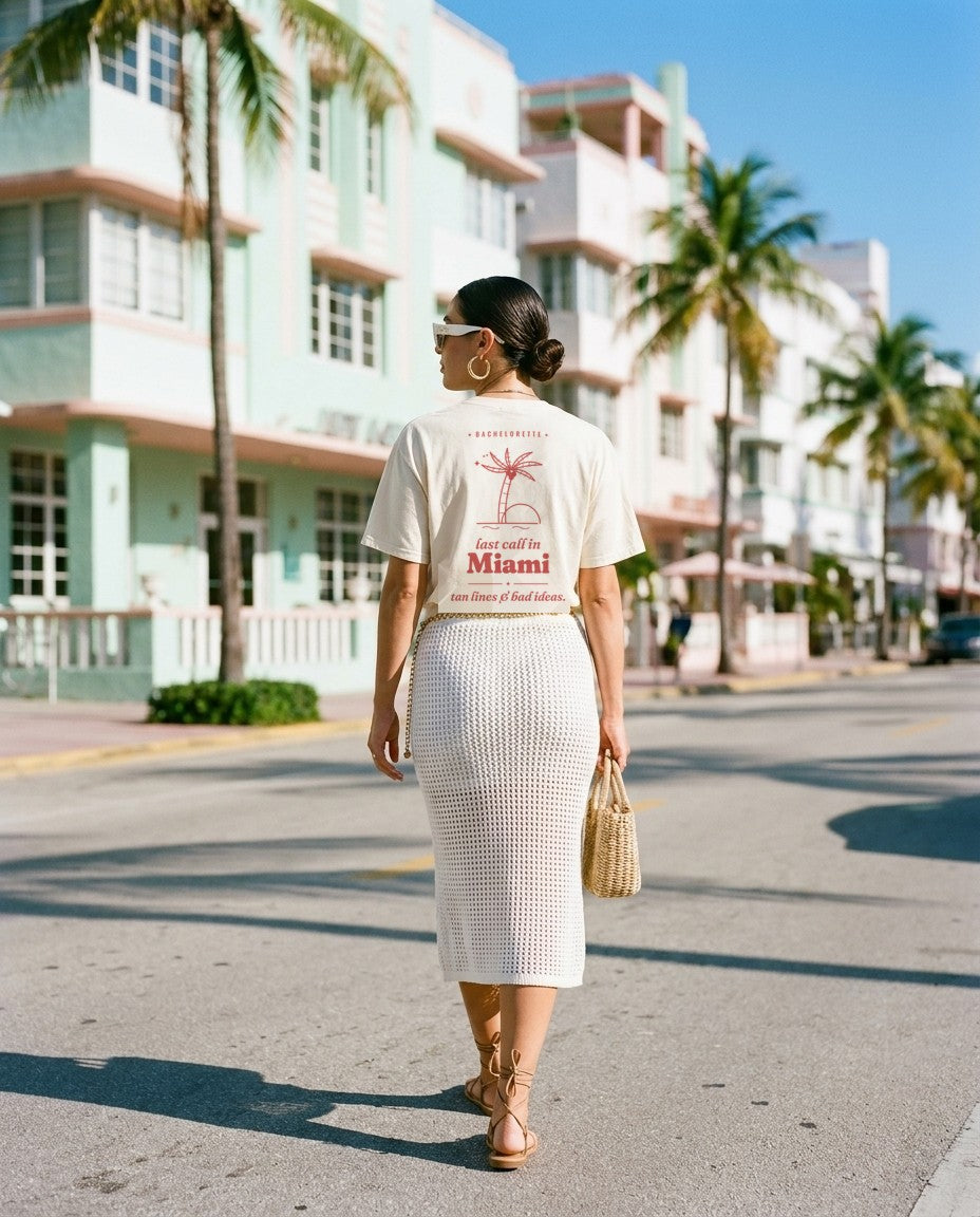 Miami Bachelorette Oversized Tee in Ivory with a crochet skirt on an Art Deco street