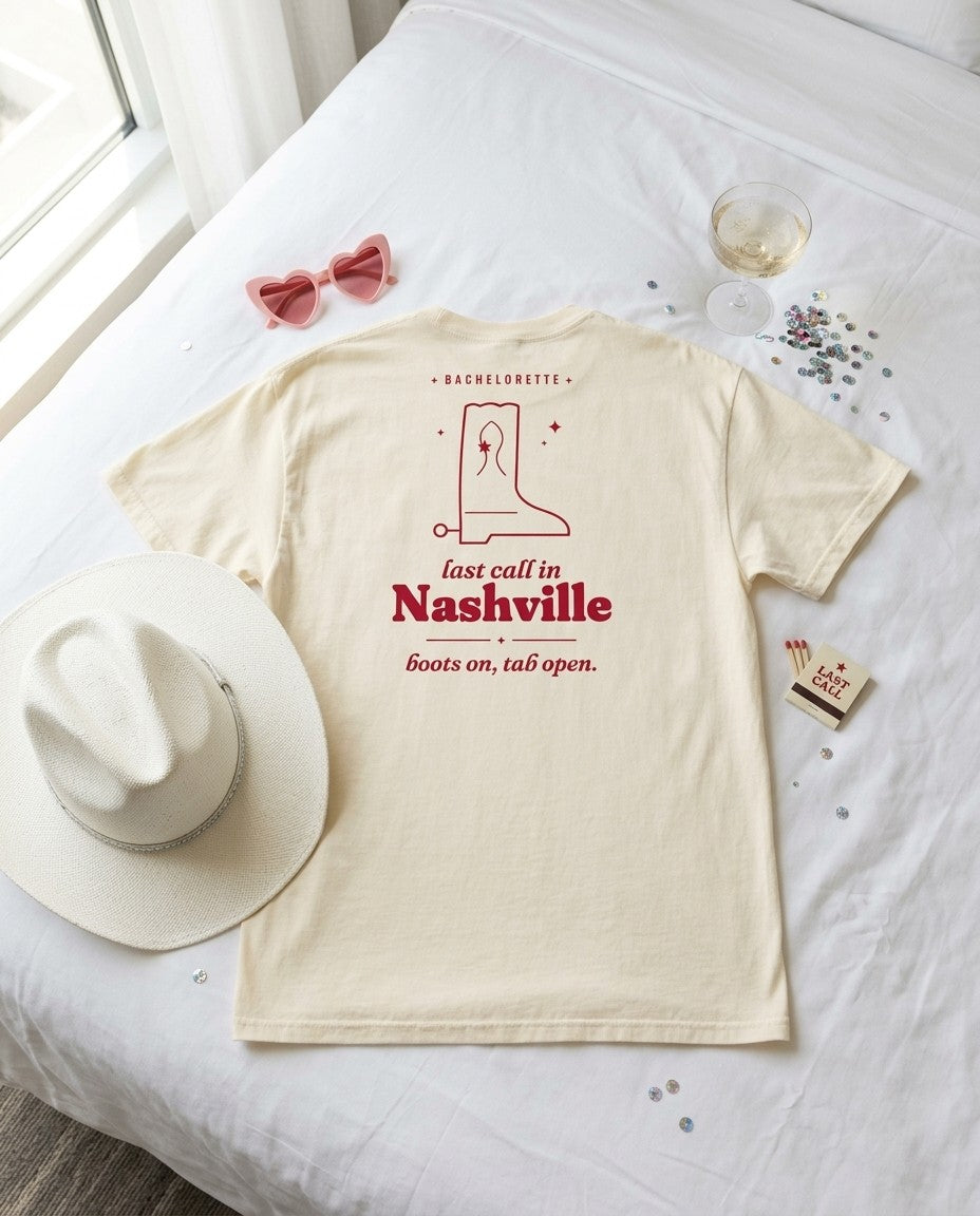 Nashville Bachelorette Oversized Tee flat lay with cowboy hat, heart sunglasses and champagne