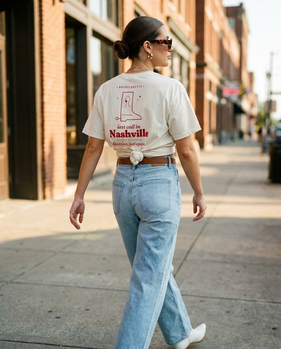 Nashville Bachelorette Oversized Tee knotted into a crop with wide-leg jeans
