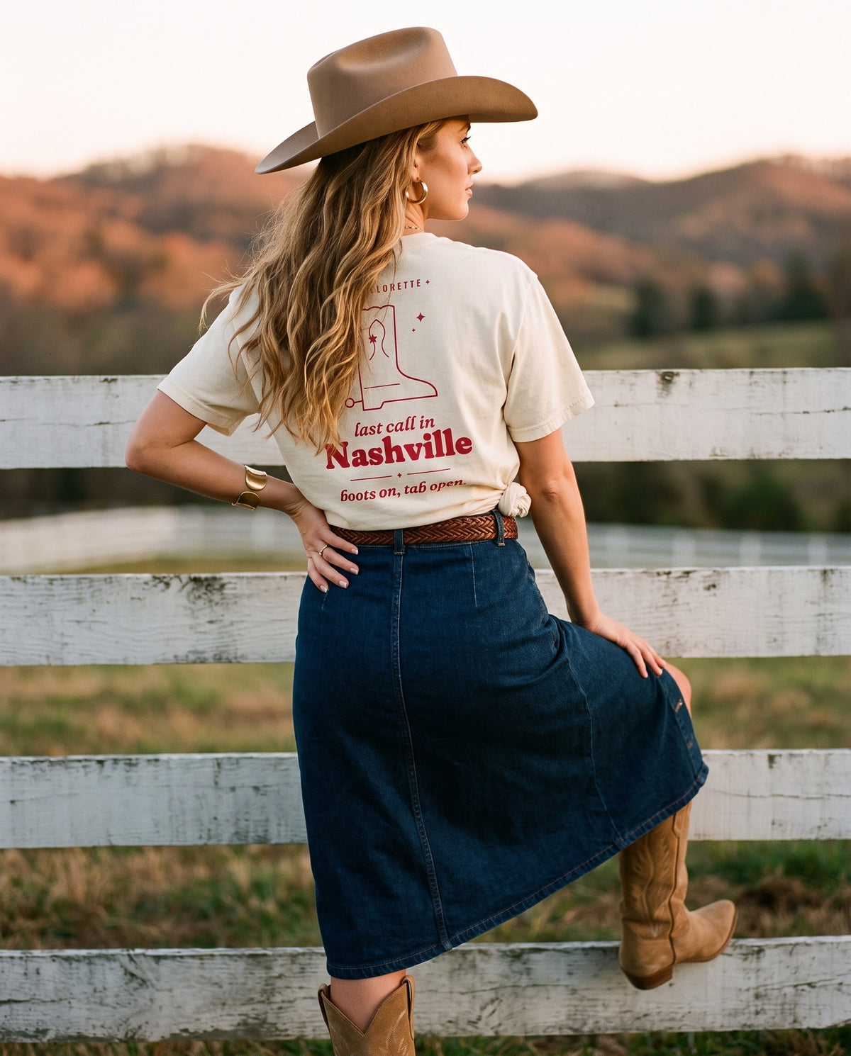 Nashville Bachelorette Oversized Tee in Ivory styled with a denim midi skirt, cowboy hat and suede boots