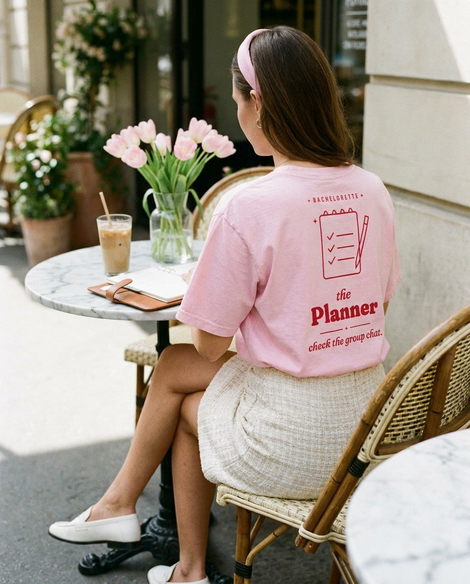 The Planner Oversized Tee in Blossom with a tweed mini skirt at a cafe