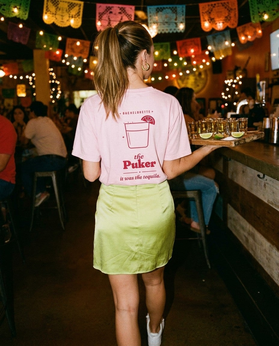 The Puker Oversized Tee in Blossom with a lime satin mini skirt at a cantina